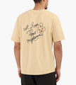 Drôle de Monsieur Esquisse Slogan T-Shirt Ocre