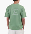 Drôle de Monsieur Le T-Shirt Slogan Calligraphy Light Green